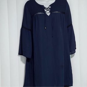 GUC Navy Dress with a a small spot at the bottom of the dress, hardly noticeable
